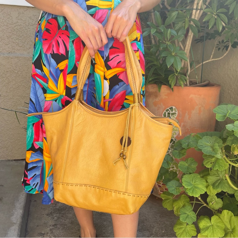 Vintage orange The SAK pebbled leather satchel with zipper closer